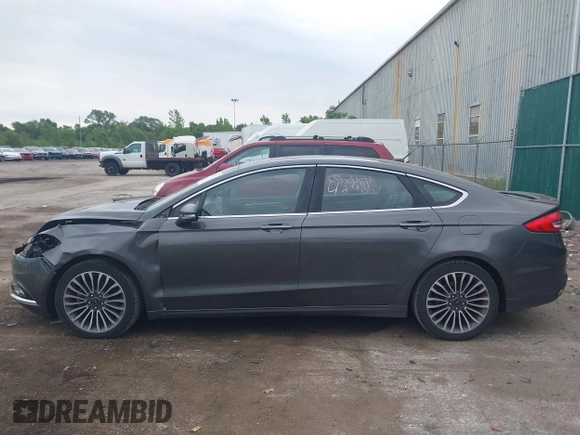 2017 Ford Fusion Titanium with VIN 3FA6P0K96HR208757, listed as a IAAI auction lot 42400172 with 90,000 mi miles and . Bid and sale history available at DreamBid. Image 14.