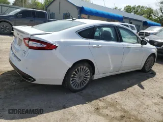 2014 Ford Fusion Titanium с VIN 3FA6P0K97ER293233, выставлен на аукционе Copart как лот 54256985 с пробегом 111 854 миль миль и Списание • Salvage title. История ставок и продаж доступна на DreamBid. Изображение 3.