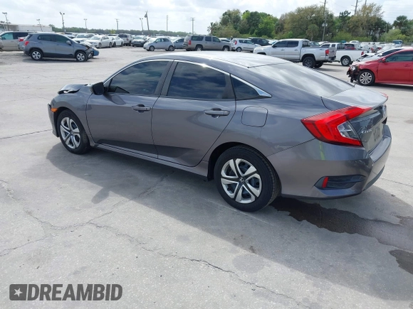 2018 Honda Civic Sedan LX with VIN 19XFC2F59JE044099, listed as a IAAI auction lot 41719337 with 44,534 mi miles. Bid and sale history available at carsss.com. Image 3.