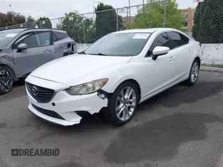 2016 Mazda Mazda6 i Touring with VIN JM1GJ1V52G1468807, listed as a IAAI auction lot 41888686 with 121,764 mi miles. Bid and sale history available at carsss.com. Image 2.