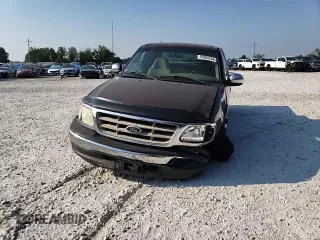 2000 Ford F-150 XL with VIN 1FTZX1726YKB41994, listed as a Copart auction lot 69300034 with Not provided miles and Salvage title. Bid and sale history available at DreamBid. Image 10.