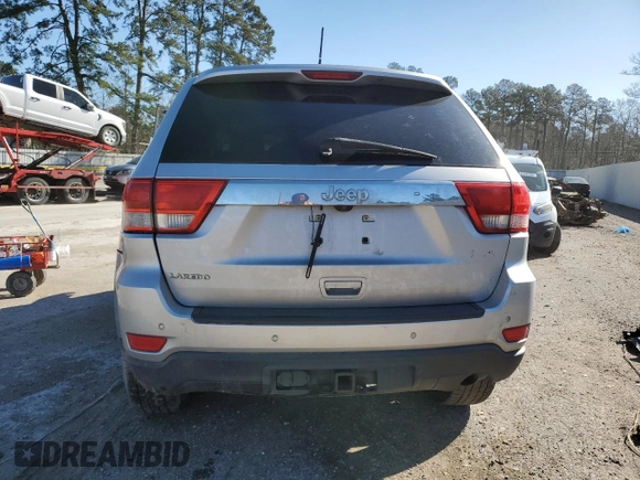 2012 Jeep Grand Cherokee Laredo with VIN 1C4RJEAG8CC212192, listed as a Copart auction lot 47857985 with 238,676 mi miles and Salvage Title. Bid and sale history available at carsss.com. Image 6.
