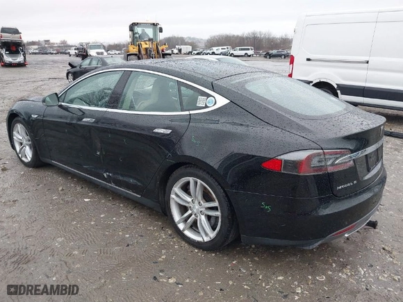 2013 Tesla Model S with VIN 5YJSA1DN9DFP03380, listed as a IAAI auction lot 41865213 with 184,831 mi miles. Bid and sale history available at carsss.com. Image 3.