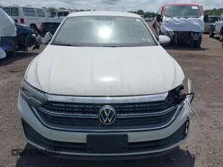 2023 Volkswagen Jetta S with VIN 3VW4M7BU9PM036109, listed as a IAAI auction lot 40129247 with 18,547 mi miles and . Bid and sale history available at DreamBid. Image 12.