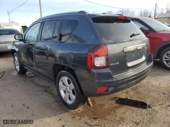 2014 Jeep Compass Sport with VIN 1C4NJDBB7ED673909, listed as a Copart auction lot 43391955 with 253,203 mi miles and Salvage Title. Bid and sale history available at carsss.com. Image 2.