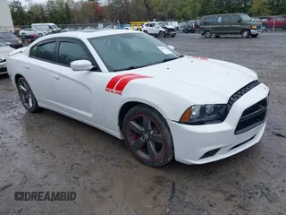 2014 Dodge Charger SXT z VIN 2C3CDXHG9EH162406, wystawiony jako IAAI lot #42159901 z przebiegiem 139 138 mil mil oraz . Historia ofert i sprzedaży dostępna na DreamBid. Obrazek 1.
