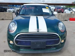 2016 MINI Hardtop 4 Door with VIN WMWXU1C52G2D10035, listed as a IAAI auction lot 42190544 with 106,383 mi miles and . Bid and sale history available at DreamBid. Image 12.
