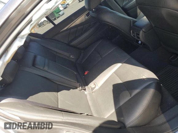 2014 Infiniti Q50 Premium z VIN JN1BV7AR1EM693471, wystawiony jako Copart lot #58991305 z przebiegiem 144 323 mil mil oraz Szkoda całkowita • Salvage title. Historia ofert i sprzedaży dostępna na DreamBid. Obrazek 10.