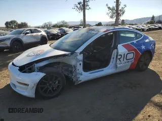 2019 Tesla Model 3 Mid Range with VIN 5YJ3E1EA4KF401500, listed as a Copart auction lot 80029064 with 100,077 mi miles and Salvage Title. Bid and sale history available at carsss.com. Image 1.