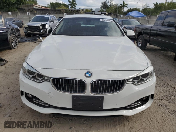 2015 BMW 4 Series 428i xDrive with VIN WBA4C9C53FG135314, listed as a Copart auction lot 82090253 with 93,188 mi miles and . Bid and sale history available at DreamBid. Image 5.