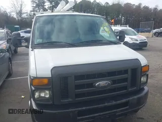 2012 Ford Econoline Cargo Commercial with VIN 1FTNE1EWXCDB38975, listed as a IAAI auction lot 41747167 with 331,484 mi miles and . Bid and sale history available at carsss.com. Image 12.