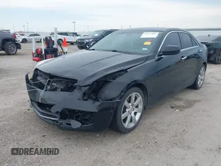 2014 Cadillac ATS Standard RWD with VIN 1G6AA5RA7E0189525, listed as a IAAI auction lot 42157087 with 54,593 mi miles and . Bid and sale history available at DreamBid. Image 2.