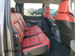 2023 Ford F-150 Lightning Pro z VIN 1FT6W1EV4PWG42053, wystawiony jako Copart lot #50003045 z przebiegiem 29 320 mil mil oraz Szkody całkowita. Historia ofert i sprzedaży dostępna na DreamBid. Obrazek 10.