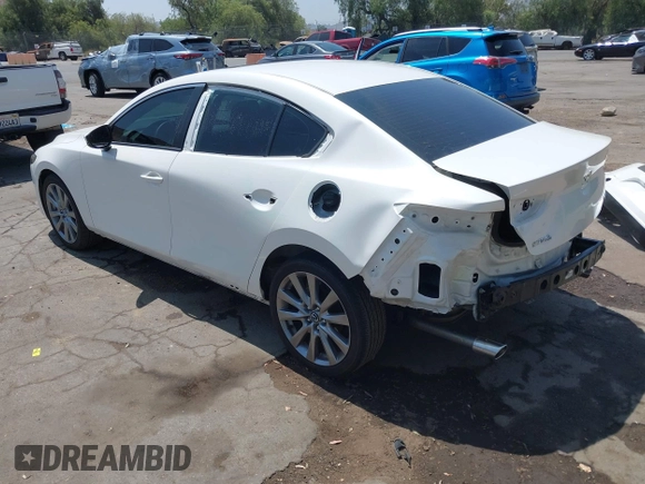 2023 Mazda 3 S Carbon Edition with VIN 3MZBPACM1PM356552, listed as a IAAI auction lot 42603574 with 20,092 mi miles and . Bid and sale history available at DreamBid. Image 3.