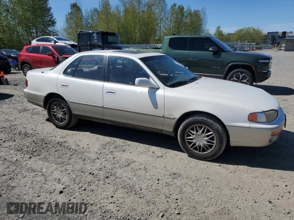 1996 Toyota Camry LE z VIN JT2BF12K5T0172341, wystawiony jako Copart lot #53384845 z przebiegiem 308 235 mil mil oraz Szkoda całkowita • Salvage title. Historia ofert i sprzedaży dostępna na DreamBid. Obrazek 4.