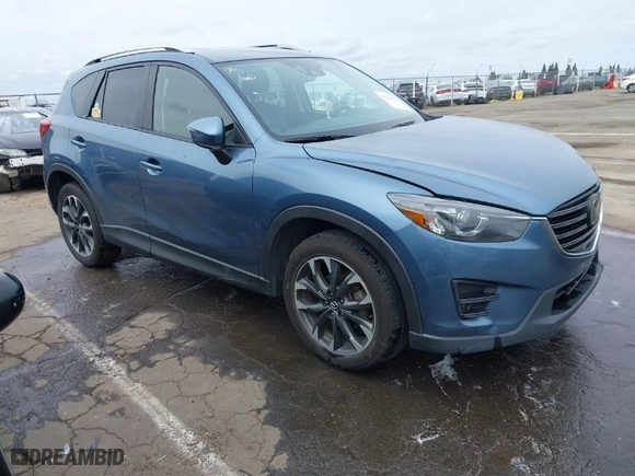 2016 Mazda CX-5 Grand Touring with VIN JM3KE4DY9G0726782, listed as a IAAI auction lot 41720512 with NaN miles. Bid and sale history available at carsss.com. Image 1.