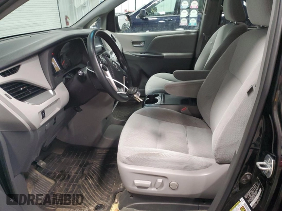 2016 Toyota Sienna LE with VIN 5TDJK3DC2GS129739, listed as a Copart auction lot 86125854 with 74,058 mi miles and Salvage Title. Bid and sale history available at carsss.com. Image 7.