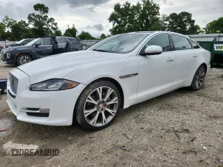 2017 Jaguar XJ Portfolio with VIN SAJWA2G71H8W09716, listed as a Copart auction lot 63814645 with 75,314 mi miles and Salvage title. Bid and sale history available at DreamBid. Image 1.