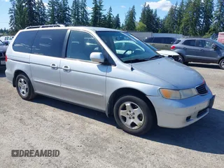 2001 Honda Odyssey EX z VIN 2HKRL18661H508619, wystawiony jako IAAI lot #42374123 z przebiegiem 155 087 mil mil oraz . Historia ofert i sprzedaży dostępna na DreamBid. Obrazek 1.