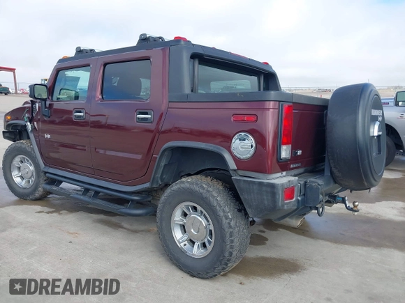2006 Hummer H2 with VIN 5GRGN22U66H104237, listed as a IAAI auction lot 41665284 with 61,984 mi miles. Bid and sale history available at carsss.com. Image 3.