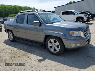 2009 Honda Ridgeline RTL z VIN 5FPYK16549B100193, wystawiony jako Copart lot #54103105 z przebiegiem 186 580 mil mil oraz Szkoda całkowita • Salvage title. Historia ofert i sprzedaży dostępna na DreamBid. Obrazek 4.