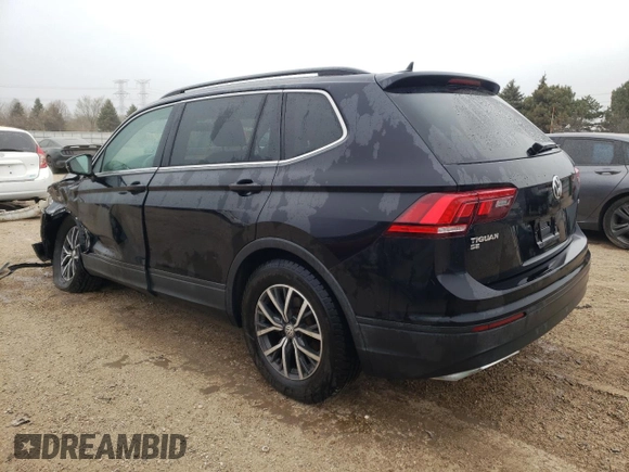 2019 Volkswagen Tiguan SE with VIN 3VV2B7AX2KM201195, listed as a Copart auction lot 52821335 with 72,382 mi miles and Salvage Title. Bid and sale history available at DreamBid. Image 2.
