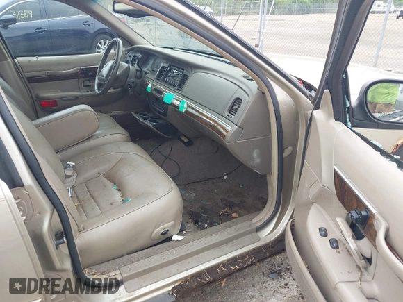 1999 Mercury Grand Marquis LS с VIN 2MEFM75W6XX630636, выставлен на аукционе IAAI как лот 42471128 с пробегом 216 223 миль миль и . История ставок и продаж доступна на DreamBid. Изображение 5.