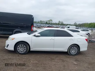 2012 Toyota Camry L z VIN 4T1BF1FKXCU525596, wystawiony jako IAAI lot #42076132 z przebiegiem 197 164 mil mil oraz . Historia ofert i sprzedaży dostępna na DreamBid. Obrazek 14.