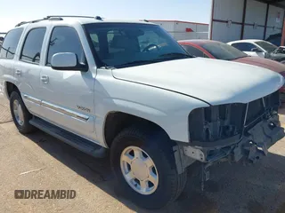 2005 GMC Yukon SLT z VIN 1GKEC13TX5R276234, wystawiony jako IAAI lot #42127846 z przebiegiem 210 802 mil mil oraz . Historia ofert i sprzedaży dostępna na DreamBid. Obrazek 1.