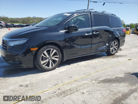 2021 Honda Odyssey Touring with VIN 5FNRL6H80MB036564, listed as a Copart auction lot 52218215 with 44,556 mi miles and Salvage Title. Bid and sale history available at carsss.com. Image 1.