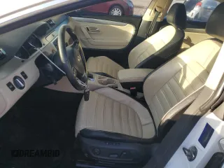 2010 Volkswagen CC with VIN WVWHN9AN6AE532487, listed as a Copart auction lot 74472224 with 119,629 mi miles and Salvage Title. Bid and sale history available at DreamBid. Image 7.