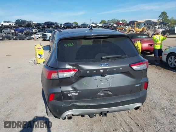 2020 Ford Escape Titanium with VIN 1FMCU9J9XLUA66440, listed as a IAAI auction lot 41464049 with 57,626 mi miles and . Bid and sale history available at DreamBid. Image 16.