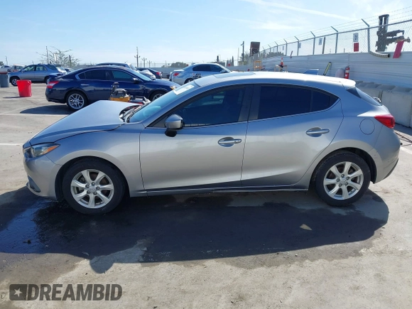 2015 Mazda 3 i Touring with VIN 3MZBM1L75FM224525, listed as a IAAI auction lot 41692928 with 57,803 mi miles and . Bid and sale history available at carsss.com. Image 14.