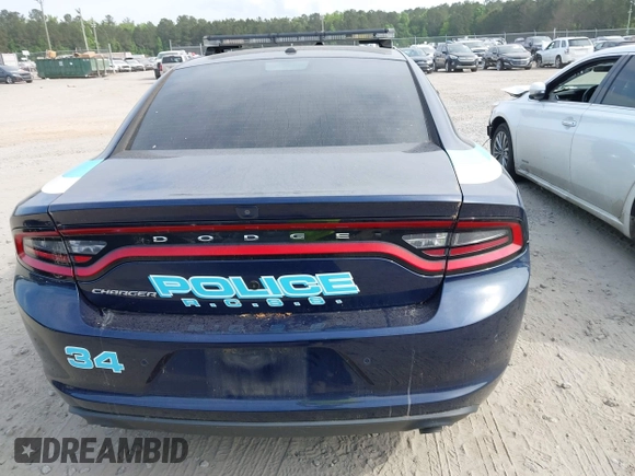 2021 Dodge Charger Police with VIN 2C3CDXAT6MH639895, listed as a IAAI auction lot 42104026 with 24,314 mi miles and . Bid and sale history available at DreamBid. Image 16.