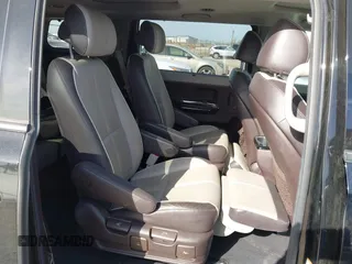 2015 Kia Sedona SX-L with VIN KNDME5C10F6033882, listed as a IAAI auction lot 41808805 with 81,936 mi miles and . Bid and sale history available at DreamBid. Image 8.