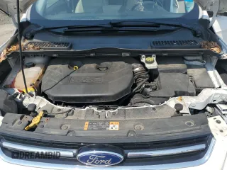 2013 Ford Escape SEL z VIN 1FMCU9H95DUD59797, wystawiony jako Copart lot #59533335 z przebiegiem 129 637 mil mil oraz Szkoda całkowita • Salvage title. Historia ofert i sprzedaży dostępna na DreamBid. Obrazek 12.