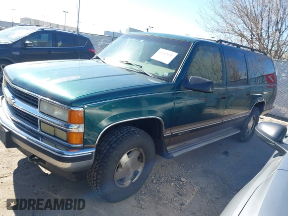 1997 Chevrolet Suburban with VIN 3GNFK16R9VG184722, listed as a IAAI auction lot 41662635 with 176,652 mi miles. Bid and sale history available at carsss.com. Image 2.