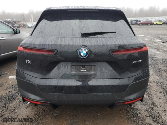 2022 BMW iX xDrive50 with VIN WB523CF06NCJ58191, listed as a Copart auction lot 84034634 with 0 mi miles and Salvage Title. Bid and sale history available at carsss.com. Image 6.