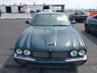 2003 Jaguar XJ with VIN SAJDA15B73MF53499, listed as a IAAI auction lot 41896445 with 95,055 mi miles and . Bid and sale history available at DreamBid. Image 12.