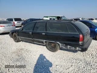 1996 Chevrolet Caprice with VIN 1G1BL82P2TR106404, listed as a Copart auction lot 74213214 with 156,588 mi miles and Salvage title. Bid and sale history available at DreamBid. Image 2.