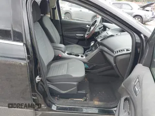 2016 Ford Escape SE with VIN 1FMCU9G99GUC13053, listed as a IAAI auction lot 41888535 with 84,019 mi miles. Bid and sale history available at carsss.com. Image 5.