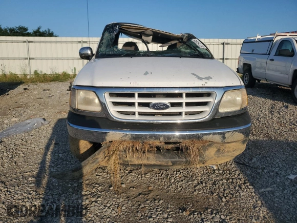 2000 Ford F-150 XL with VIN 1FTZF1727YKB49797, listed as a Copart auction lot 62154595 with Not provided miles and Salvage title. Bid and sale history available at DreamBid. Image 5.