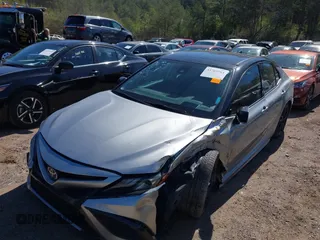 2022 Toyota Camry TRD with VIN 4T1KZ1AK8NU061810, listed as a IAAI auction lot 41769584 with 79,709 mi miles and . Bid and sale history available at DreamBid. Image 6.