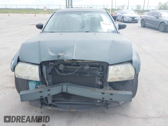 2006 Chrysler 300 with VIN 2C3KA43R56H217771, listed as a IAAI auction lot 41859397 with 154,227 mi miles. Bid and sale history available at carsss.com. Image 6.