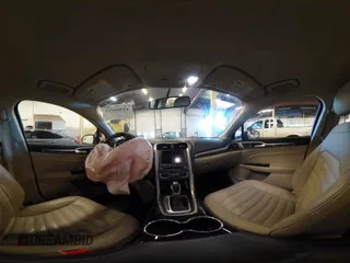 2016 Ford Fusion SE Hybrid with VIN 3FA6P0LU9GR235291, listed as a IAAI auction lot 41560312 with 112,777 mi miles. Bid and sale history available at carsss.com. Image 17.