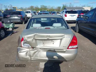 2003 Hyundai Elantra GLS z VIN KMHDN45D93U495703, wystawiony jako IAAI lot #42137927 z przebiegiem 93 287 mil mil oraz . Historia ofert i sprzedaży dostępna na DreamBid. Obrazek 16.