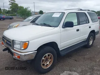 1998 Toyota 4Runner with VIN JT3GM84R5W0031171, listed as a IAAI auction lot 41989920 with 163,296 mi miles and . Bid and sale history available at DreamBid. Image 2.