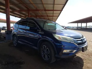 2015 Honda CR-V EX with VIN 2HKRM3H5XFH512244, listed as a IAAI auction lot 41950357 with 124,005 mi miles and . Bid and sale history available at carsss.com. Image 1.