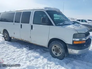 2012 Chevrolet Express Passenger 1LT with VIN 1GAZG1FG0C1150999, listed as a IAAI auction lot 41475070 with 334,911 mi miles. Bid and sale history available at carsss.com. Image 1.