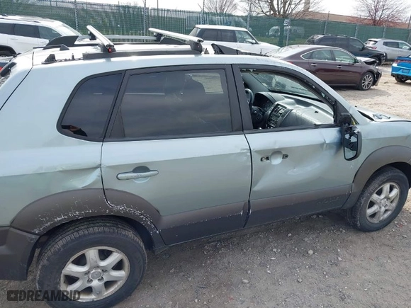 2005 Hyundai Tucson GLS with VIN KM8JN72D95U040538, listed as a IAAI auction lot 41834195 with NaN miles. Bid and sale history available at carsss.com. Image 16.